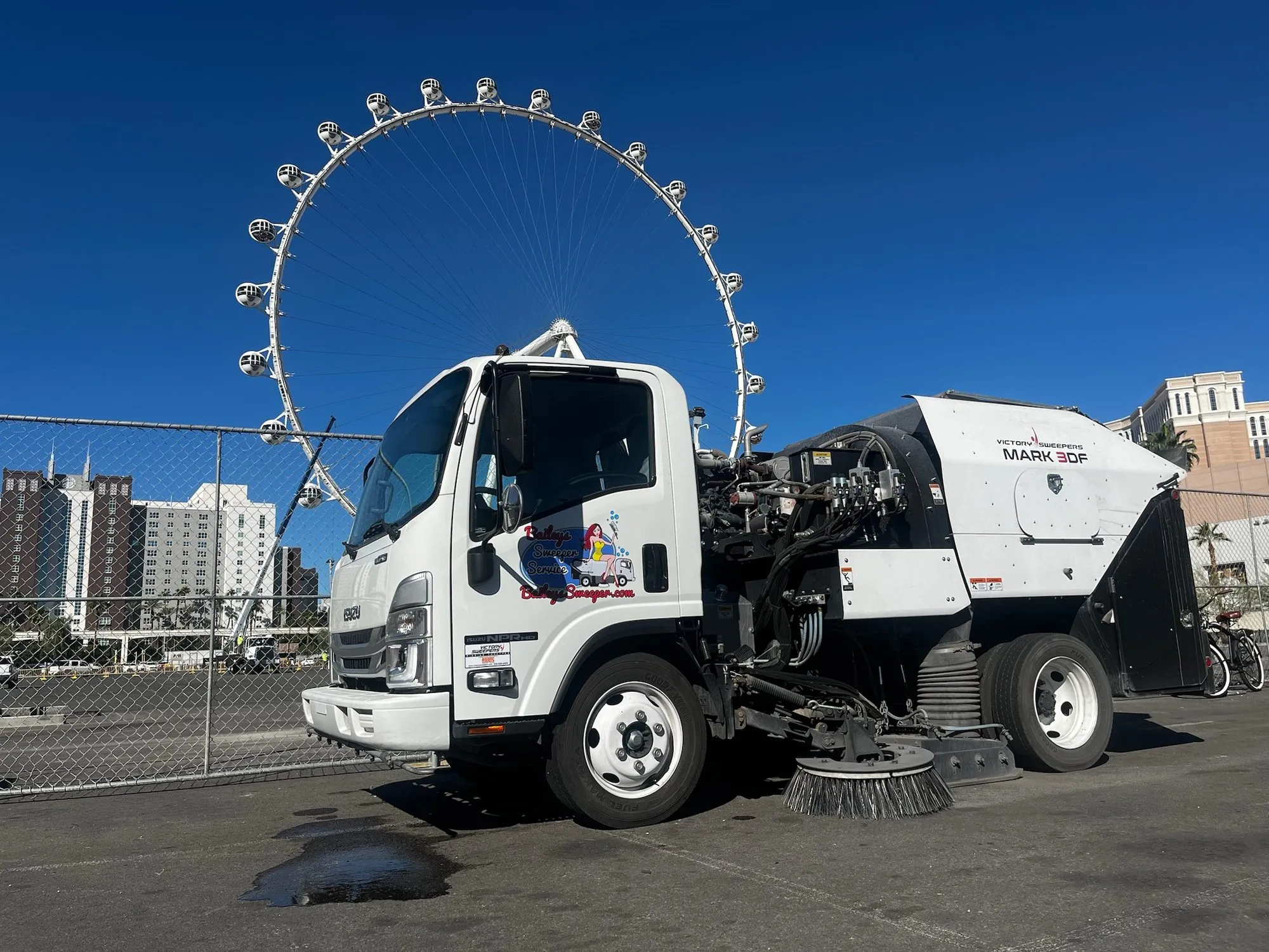 Bailey's sweeper truck at the LINQ with the High Roller observation wheel behind it