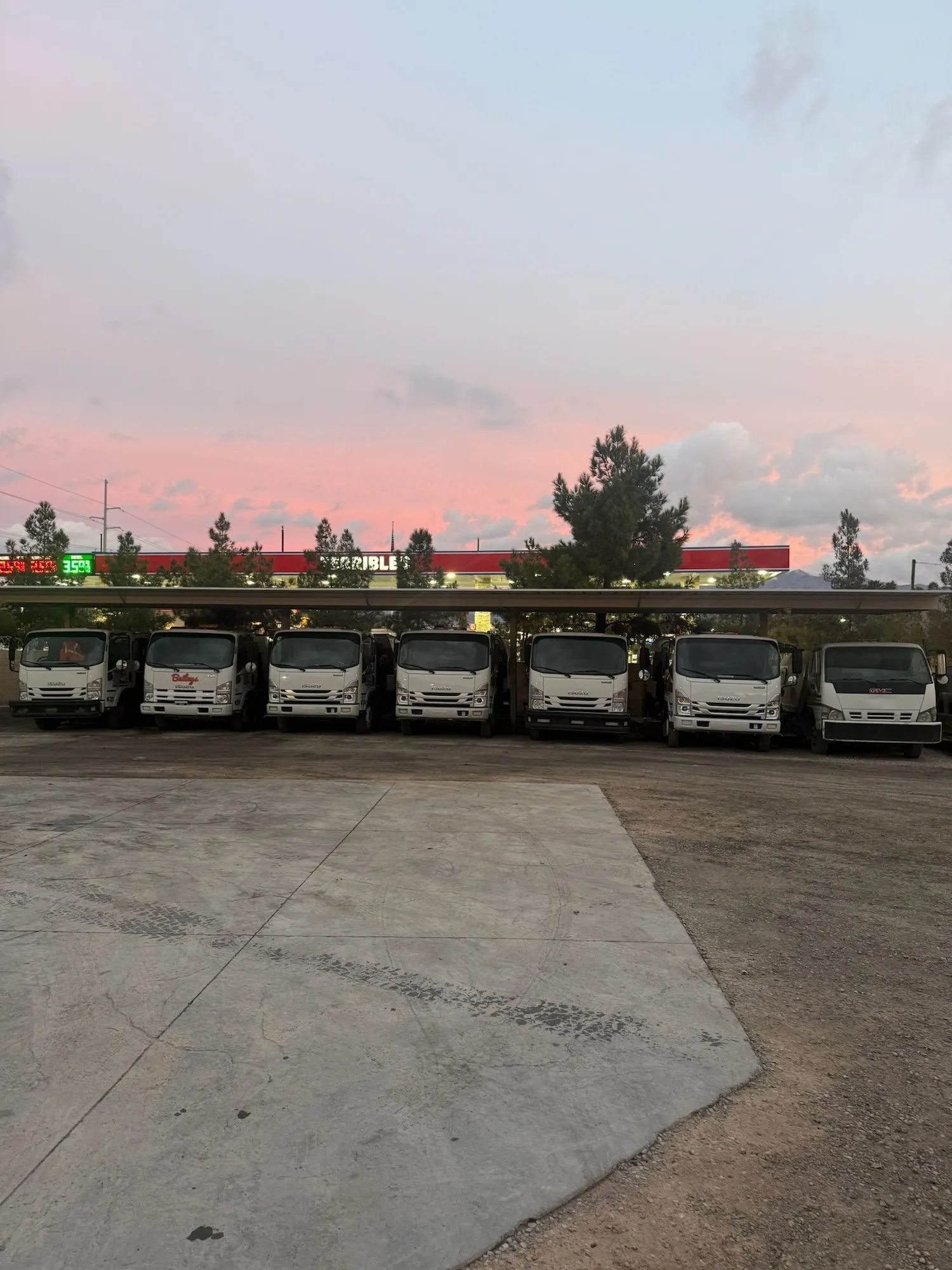 Bailey's sweeper fleet lined up at the Las Vegas yard at sunset