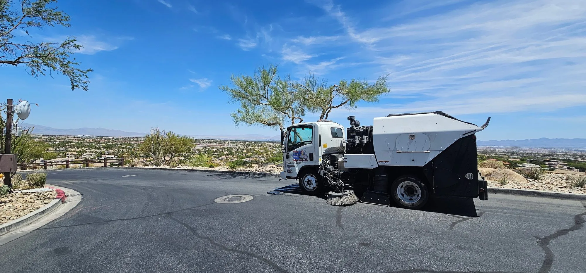 Bailey's sweeper at a Ridges cul-de-sac with the wider Las Vegas valley behind