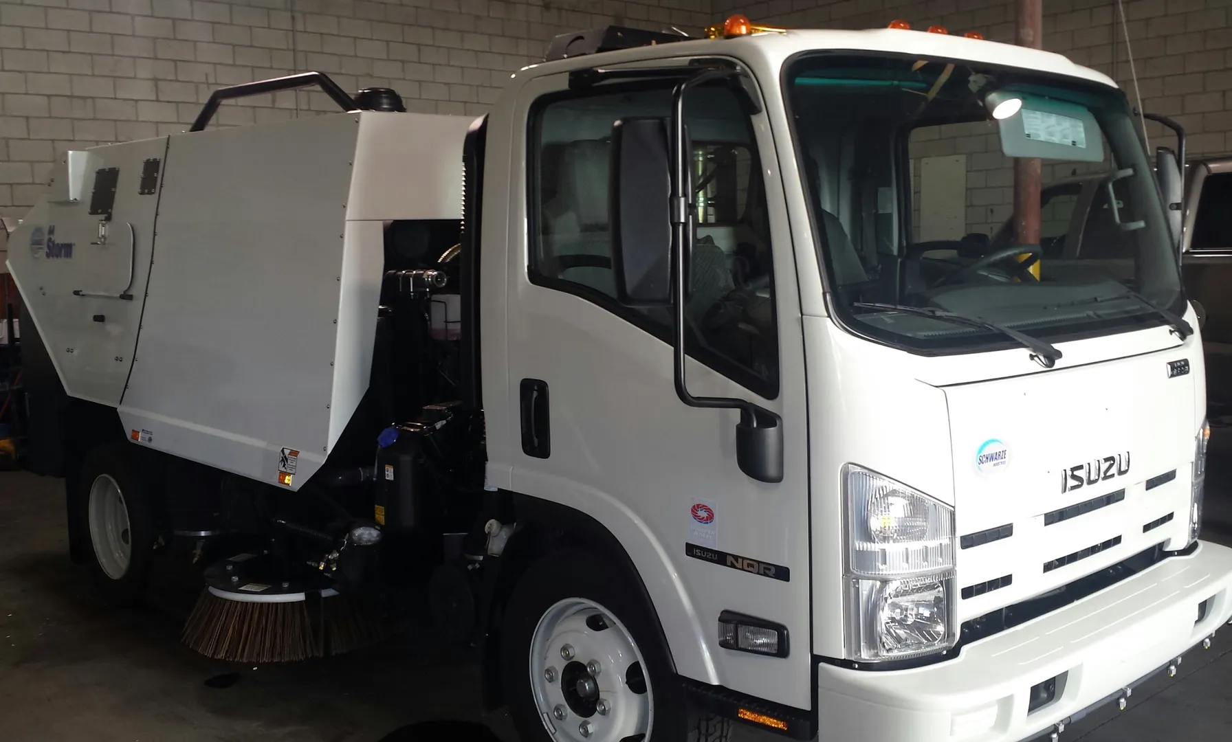 A new Schwarze Storm sweeper on an Isuzu NQR chassis at the Bailey's shop
